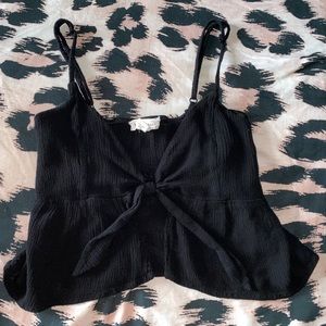 Open black crop top with bow